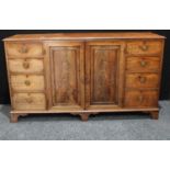 A George III mahogany low housekeeper's or press cupboard, in the manner of Gillows,