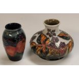 A contemporary Moorcroft Blackberry and Leaves pattern compressed ovoid vase, 11cm,