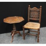 A 19th century oak tripod occasional table, octagonal top, canon-barrel column; a hall chair,