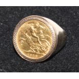 An Edward VII gold half sovereign, mounted in a 9ct gold signet ring, 1910, 12.