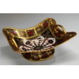 A Royal Crown Derby Imari palette 1128 pattern rounded rectangular two handled pedestal basket,