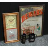 Brewerania - a Royal Doulton Golden Eagle decanter; a White Horse wall clock with mirror;