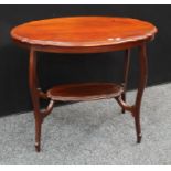 An Edwardian mahogany centre table with undertier
