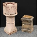 A substantial terracotta chimney pot, 88.5cm high, 40.