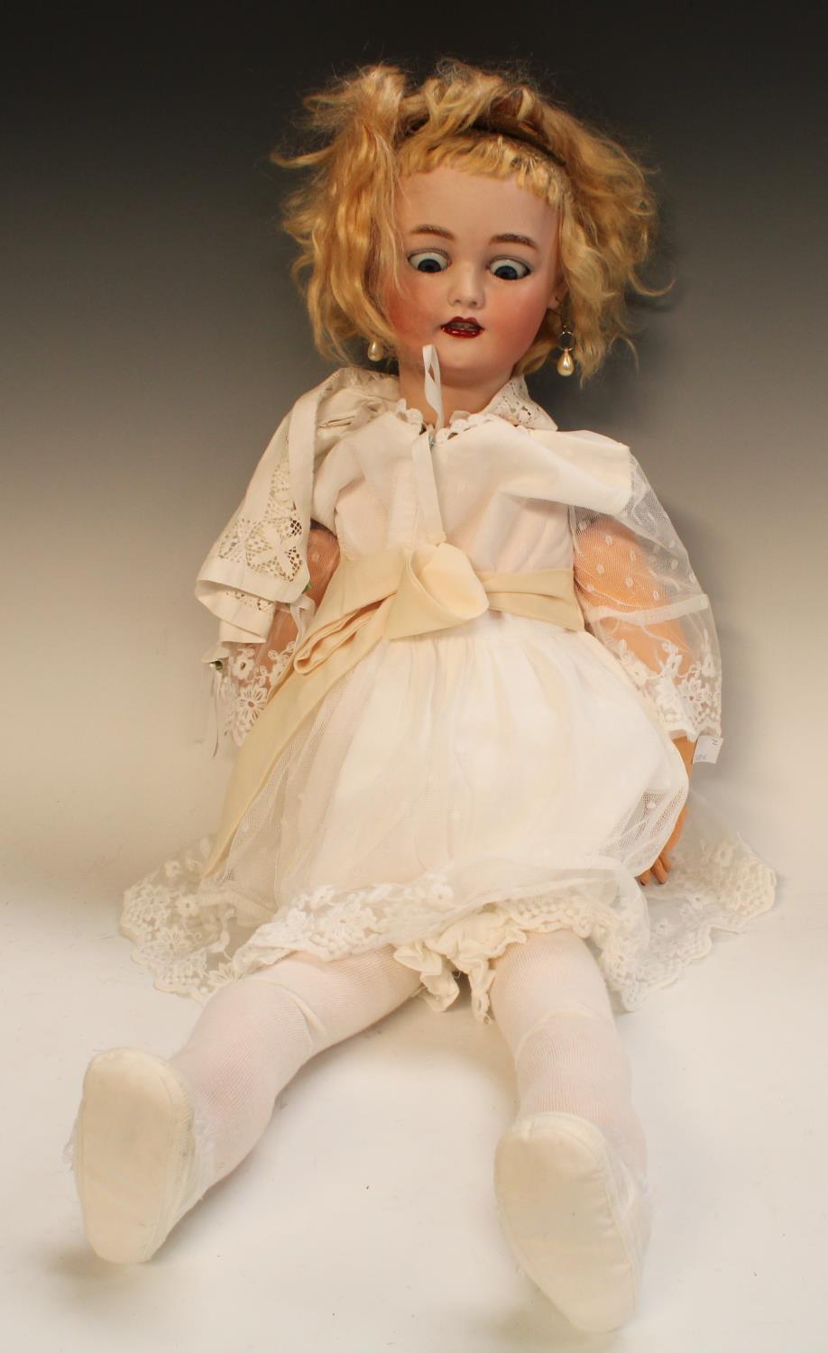 Simon Halbig - a late 19th /early 20th century porcelain socket head doll, sleeping blue eyes,