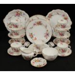 A Royal Crown Derby Posie pattern tea set, nine cups, saucers and tea plates, milk and sugar,