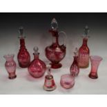A large Bohemian ruby flashed clear glass single handled jug, faceted drop in stopper,