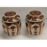 A pair of Royal Crown Derby Imari palette 1128 pattern ginger jars and covers, 11cm, printed marks,