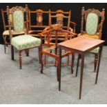 An early 20th century mahogany three piece salon suite,