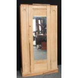 A Country house pine wardrobe;