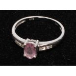 A modern diamond and pink topaz dress ring, 9ct white gold shank, 1.