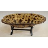 Interior Design - a novelty moulded faux tortoiseshell dish on stand,