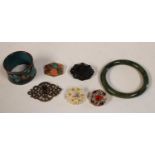 A polished jadeite bangle; a mirco mosaic brooch; a cloisonne napkin ring;