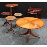 A Regency style low circular occasiontal table; three similar wine tables;