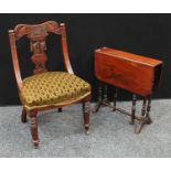 A mahogany boudoir chair, shaped cresting rail carved and applied with a well potted urn,