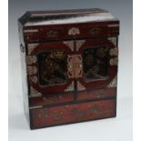 A 19th century Japanese lacquered table cabinet