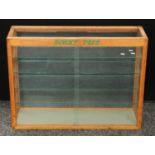 Advertising - a mid 20th century Dinky Toys oak counter top shop display cabinet,