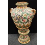 A substantial Italian design majolica type urn on stand,