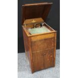 An oak cased gramophone,