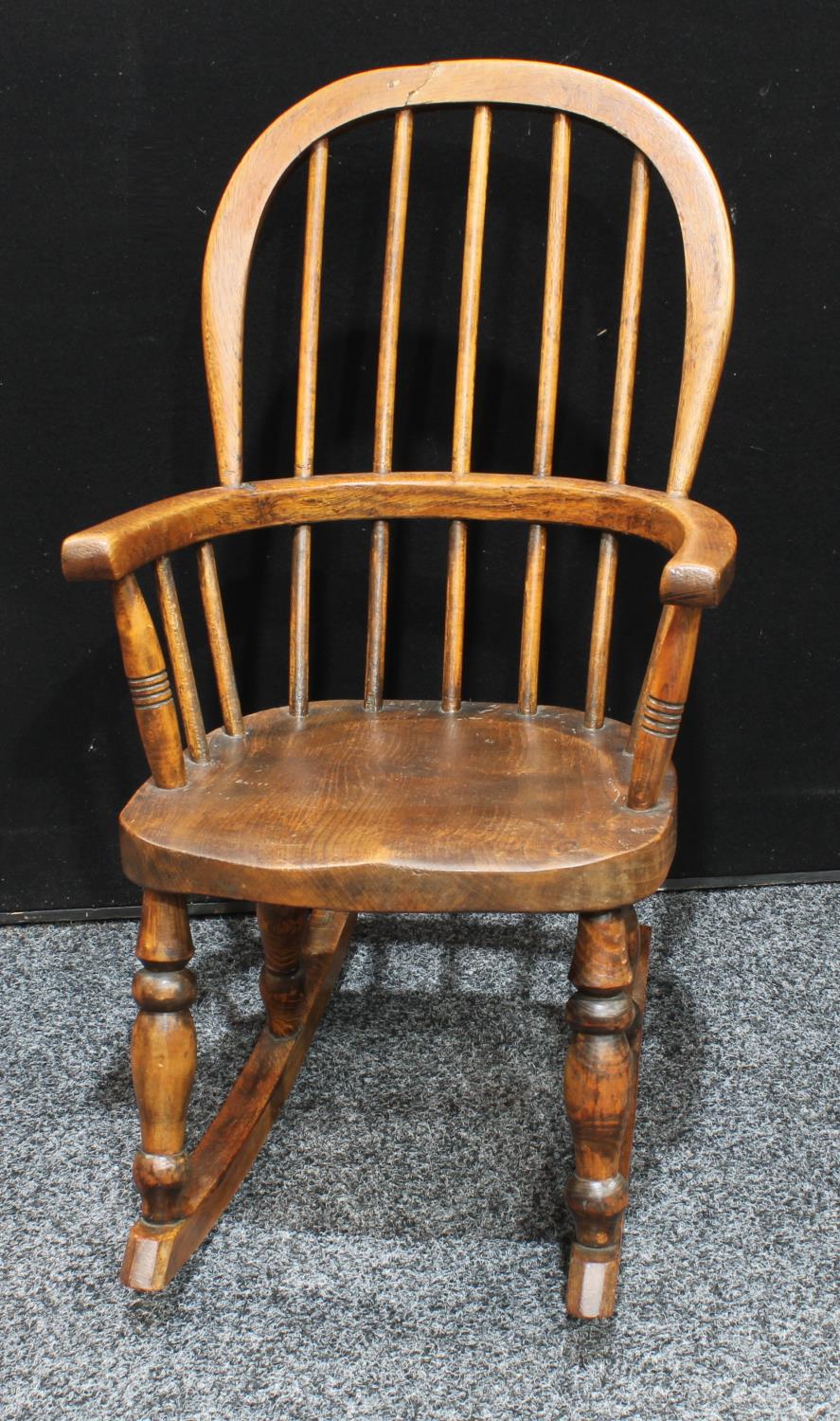 A Country House child's Windsor rocking chair, hoop back, bowed mid-rail, saddle seat, - Image 2 of 4