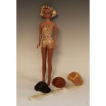 A 1960s Fashion Queen Barbie doll, with original gold and white swim costume, Stocking,