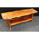 A Naturalistically formed yew garden/conservatory table,