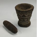 A Javanese pestle and mortar