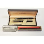 Pens - two Waterman's fountain pens with 14ct gold nibs; a boxed Sheaffer fountain pen;