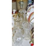 Decanters - a cut glass ship's decanter; mallet shaped decanter; others; a cut glass jug;