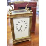 A 19th century travellers carriage clock in Moroccan leather carrying case c.