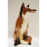 A large Beswick seated fox model approx 31cm height
