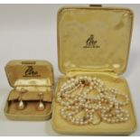 A Ciro double strand of pearls with 9ct gold clasp; an 18ct gold ring 1.