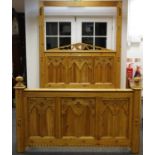 *** Withdrawn *** A modern Gothic pine double bed, the head and footboards carved with Gothic arches