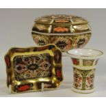 A Royal Crown Derby 1128 pattern octagonal box and cover printed marks date code for 1933;