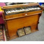 An unusually small pump/pedal organ,