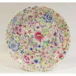 A late 19th century Chinese Gangxu Famille Rose pattern dish