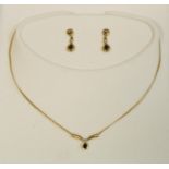 A 9ct gold contemporary necklace & pendant with conforming each set with a teardrop sapphire in