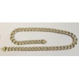 A thick silver curb chain stamped 925 94.