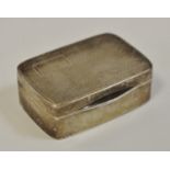 An early 20th century silver snuff box dated 1936, engine turned,