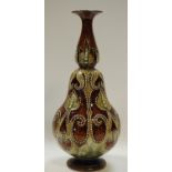 A treacle glaze royal Doulton vase by Frank Butler