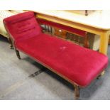 A Victorian mahogany chaise with burgundy upholstery
