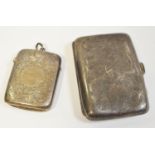 A silver cigarette case,