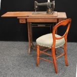 An early 20th century Singer sewing machine,