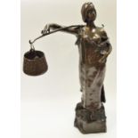 A Bronze Figure - Water carrier,