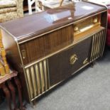 A retro 1950's/1960's Blaupunkt Arkansas Delux radiogram, four speed Garrard record deck and radio.