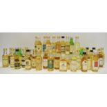 Whisky Miniatures - a Lochindaal 10 year aged bottle;
