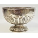 A late Victorian silver pedestal punch bowl; half ribbed, William Hulton and Sons ltd Sheffield,