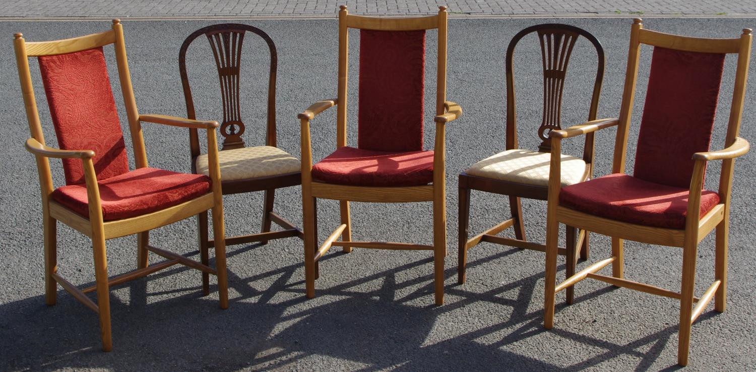 Three contemporary elm carver chairs;