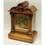 A Victorian walnut mantel clock,