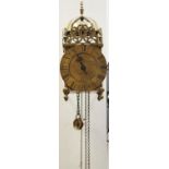 A brass lantern clock,